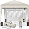 A pop-up canopy tent and its accessories are displayed against a white background. The tent is set up, and the accessories, including a carrying bag, folded frame, weights, and stakes, are arranged around it. Náhľad obrázku produktu