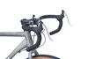 Close-up view of a bicycle's handlebars and front fork. Produktbild-Vorschau