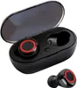 A pair of black wireless earbuds with red accents, shown inside their charging case, with one earbud placed outside the case. Náhled obrázku produktu