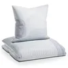 A folded duvet and pillow with a wave-like pattern. Produktbild-Vorschau