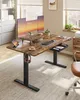 A modern home office setup with a height-adjustable desk, multiple monitors, and a chair. Produktbild-Vorschau