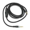A black audio cable with 3.5mm connectors and an in-line volume control. Náhľad obrázku produktu