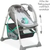 A Hauck Sit N Relax baby swing is shown against a white background. The swing is gray and white with teal accents. There are two small plush toys hanging from the top of the swing. Text in German is present on the right side of the image, indicating that t Produktbild-Vorschau