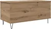 A wooden storage chest with black hairpin legs, shown from the front on a white background. Voir les images du produit