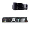A black AV receiver and its remote control are displayed against a white background. Podgląd zdjęcia produktu