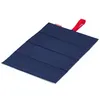 A folded blue seat pad with a red loop on a white background. Produktbild-Vorschau