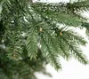 Close-up view of artificial Christmas tree branches with small lights. Produktbild-Vorschau