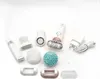 A collection of Braun Silk-epil 9 epilator attachments and accessories laid out on a white background. Náhled obrázku produktu