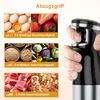 A hand holding an immersion blender with images of food items and speed settings displayed. Produktbild-Vorschau