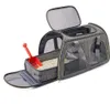 A gray pet carrier with a litter box and scoop inside, shown against a white background. Náhled obrázku produktu