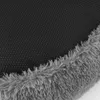 A close-up view of the underside and fluffy edge of a round pet bed. Produktbild-Vorschau