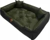 A dog bed with raised sides and two small pillows inside. Náhľad obrázku produktu