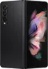 A black Samsung Galaxy Z Fold 3 5G smartphone is shown unfolded, displaying its screen with a colorful abstract wallpaper. The back of the phone with its camera array is visible on the left. Náhled obrázku produktu