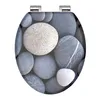 A toilet seat with a stone pattern. Anteprima dell’immagine prodotto