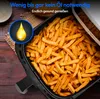 A close-up shot of french fries in an air fryer, with a graphic of a golden oil drop and text overlay. Produktbild-Vorschau