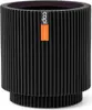 A black ribbed cylindrical planter with an orange and white label on the front. Voir les images du produit