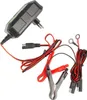 A battery charger with various cables and connectors is laid out on a white background. Náhľad obrázku produktu