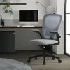 An office chair is shown in a home office setting. Produktbild-Vorschau