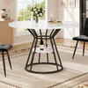 A dining table set with chairs in a well-lit room, featuring a coffee machine in the background. Produktbild-Vorschau
