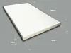 A white foam mattress topper with dimensions indicated by measurement lines. Produktbild-Vorschau
