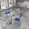 A cafe or restaurant interior with tables and chairs. Produktbild-Vorschau