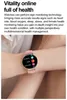 A person's arm wearing a smartwatch with a pink band. Produktbild-Vorschau