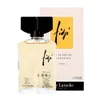 A bottle of Guy Laroche Fidji Eau de Parfum and its packaging are displayed against a white background. Podgląd zdjęcia produktu