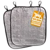 Two silver insulated seat cushions with black trim and loops, one with an orange tag attached. Produktbild-Vorschau
