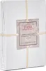 A white duvet cover is folded and tied with a light-colored ribbon, with a product tag attached. Produktbild-Vorschau
