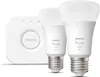 A Philips Hue starter set with a bridge and two light bulbs, presented on a white background. Produktbild-Vorschau
