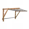 A wall-mounted drying rack with wooden supports and metal bars. Produktbild-Vorschau