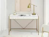 A white desk with gold accents, a lamp, a book, and a mug. Anteprima dell’immagine prodotto