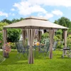 A gazebo set up in a garden with a table and chairs, and a grill nearby. Produktbild-Vorschau