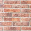 A close-up view of a brick wall texture. Produktbild-Vorschau