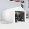 A white tent garage structure with shelves and storage bins inside, set up on a concrete surface next to a building. Náhled obrázku produktu