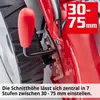 A close-up view of a red lawnmower's height adjustment mechanism, showing a red lever and a numbered scale. Produktbild-Vorschau