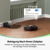 Two robot vacuum cleaners on a wooden floor, with a pop-up window showing a schedule setting. Produktbild-Vorschau