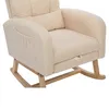A close-up view of a beige rocking chair. Voir les images du produit
