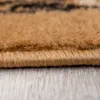 A close-up view of the edge of a carpet, showing the texture of the fibers and the binding. Produktbild-Vorschau