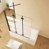 A shower screen installed on a bathtub in a bathroom. Produktbild-Vorschau