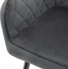 A close-up view of the quilted velvet upholstery of a chair. Produktbild-Vorschau