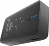 A black power bank with blue LED indicators and a USB port. Produktbild-Vorschau