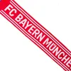 A red and white scarf with text on it. Anteprima dell’immagine prodotto
