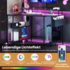 A gaming desk setup with LED lighting and various accessories. Produktbild-Vorschau