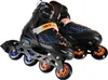 A pair of black and orange inline skates with blue accents, displayed against a white background. Voir les images du produit