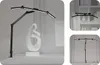Collage of a black LED desk lamp in different settings and configurations. Náhled obrázku produktu