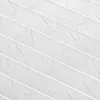 A close-up, abstract view of a white pleated fabric with diagonal lines and a textured surface. Produktbild-Vorschau
