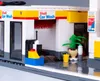 A close-up view of a Lego Shell gas station with a car wash. Podgląd zdjęcia produktu