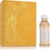 A perfume box and bottle are displayed side-by-side against a white background. Voir les images du produit