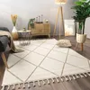A living room scene with a rug, furniture, and plants. Anteprima dell’immagine prodotto